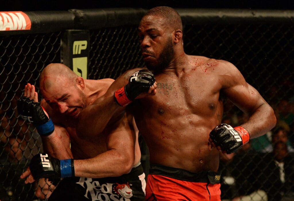 BALTIMORE, MD - APRIL 26: (R-L) Jon "Bones" Jones elbows Glover Teixeira in their light heavyweight championship bout during the UFC 172 event at the Baltimore Arena on April 26, 2014 in Baltimore, Maryland. (Photo by Patrick Smith/Zuffa LLC/Zuffa LLC via Getty Images)