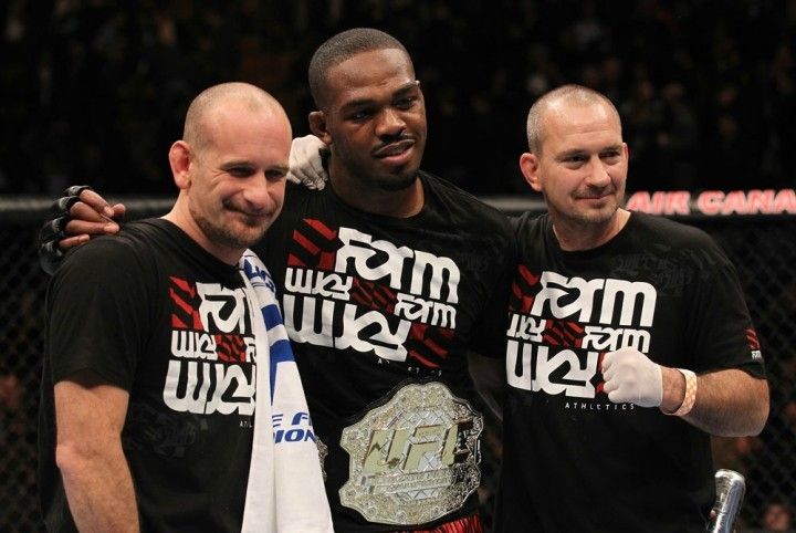 TORONTO, ON - DECEMBER 10: UFC Light Heavyweight Champion Jon "Bones" Jones poses for a photo with his trainers Greg Jackson (L) and Mike Winklejohn (R) after defeating Lyoto Machida during the UFC 140 event at Air Canada Centre on December 10, 2011 in Toronto, Ontario, Canada. (Photo by Nick Laham/Zuffa LLC/Zuffa LLC via Getty Images)