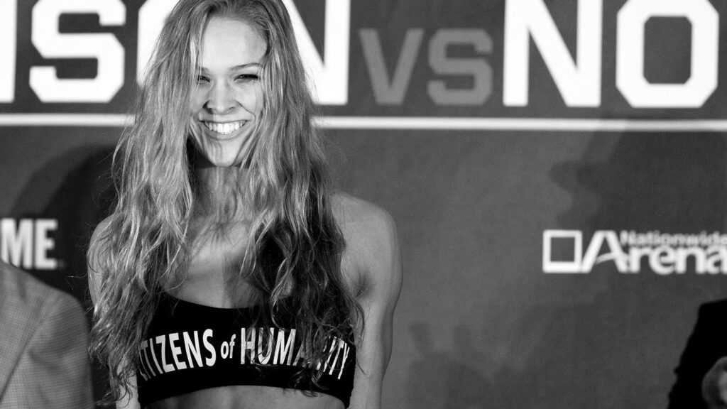 Ronda Rousey looking confident at a weigh-in. 