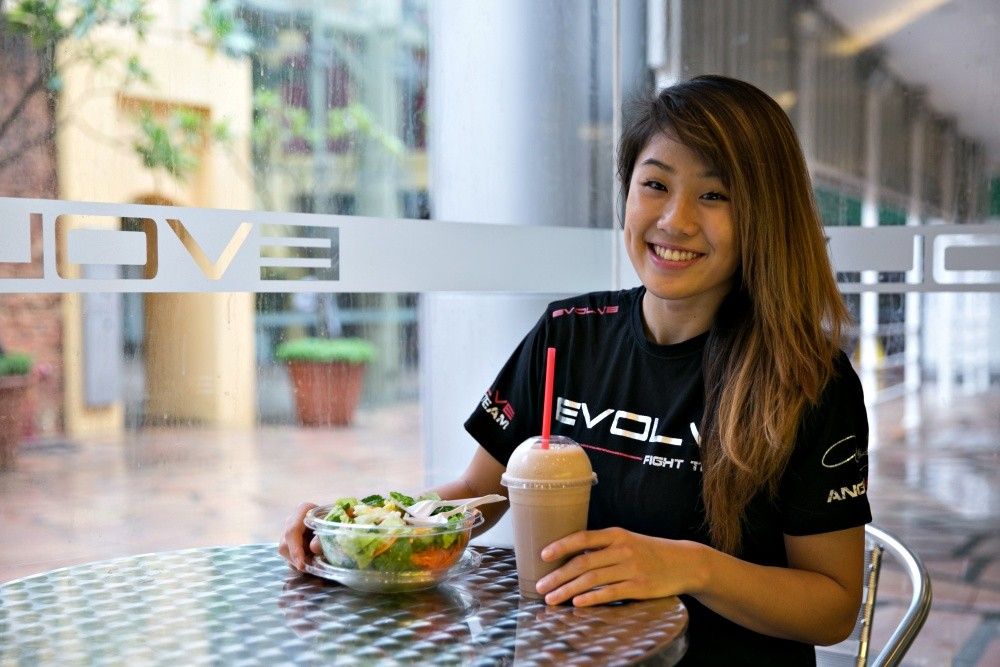 ONE Superstar Angela Lee enjoys her salad and smoothie after a hard day of training!