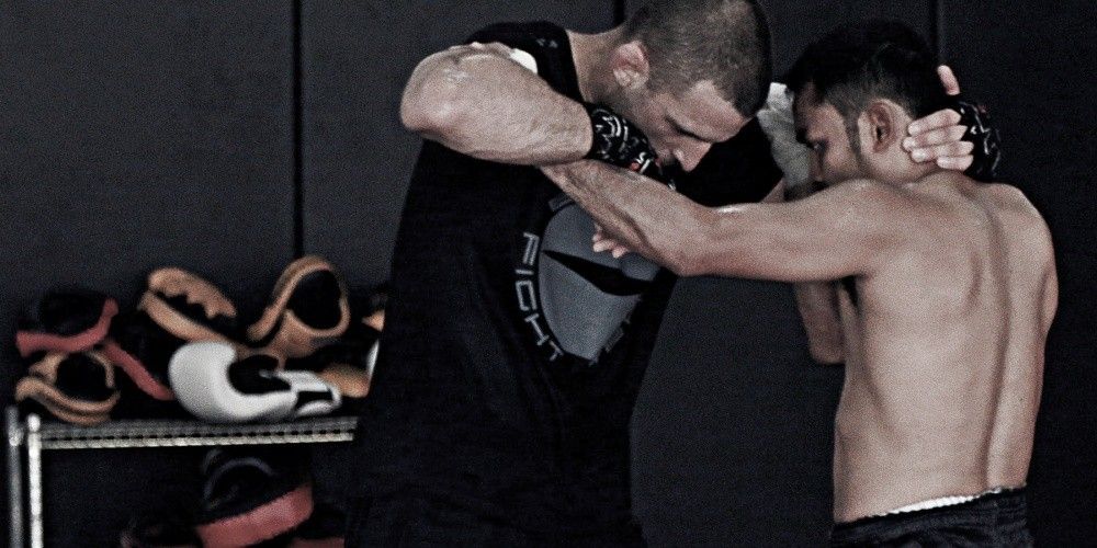 Former Strikeforce Welterweight Champion and UFC Fighter Tarec Saffiedine works on his clinch with multiple-time Muay Thai World Champion and ONE Strawweight World Champion Dejdamrong Sor Amnuaysirichoke. 