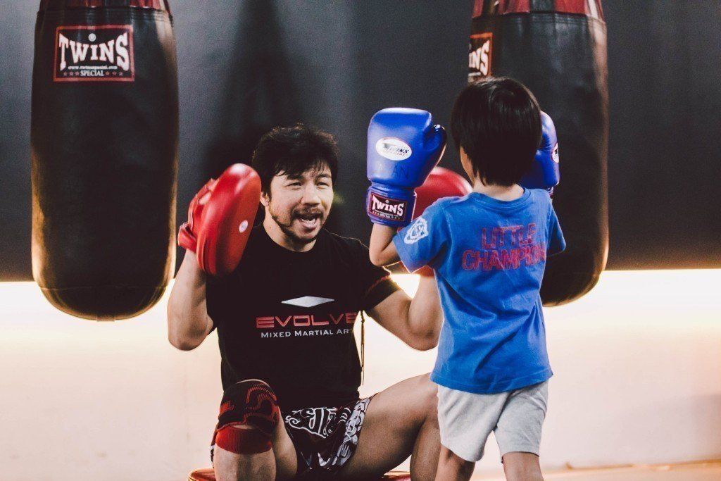Multiple-time Muay Thai World Champion Muangfalek Kiatvichian teaches at Evolve MMA.